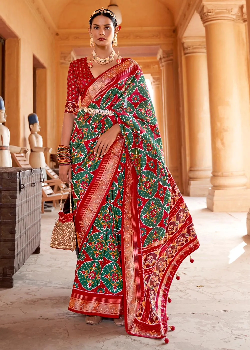 Green & Red Printed Patola Silk Saree with Zari Border & Tassels on Pallu