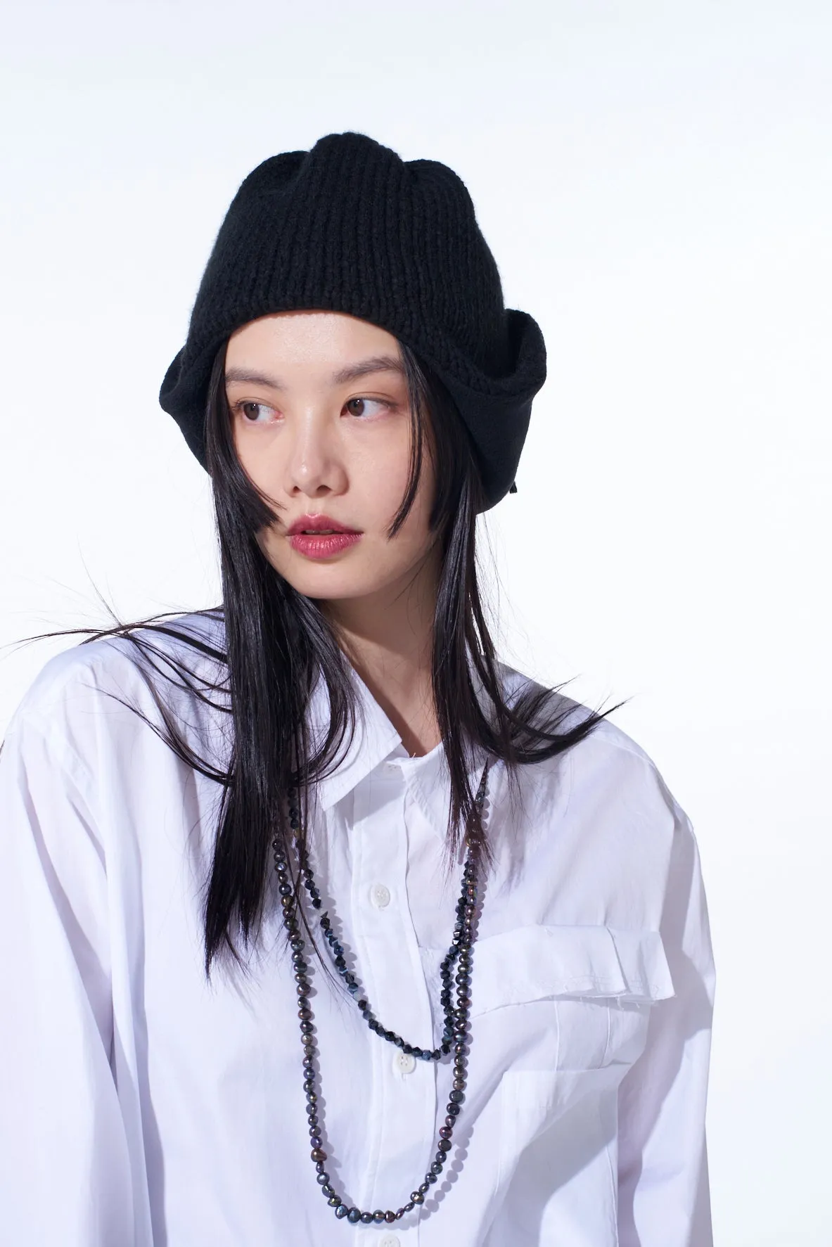 KNIT BEANIE WITH FRINGED EARPIECES